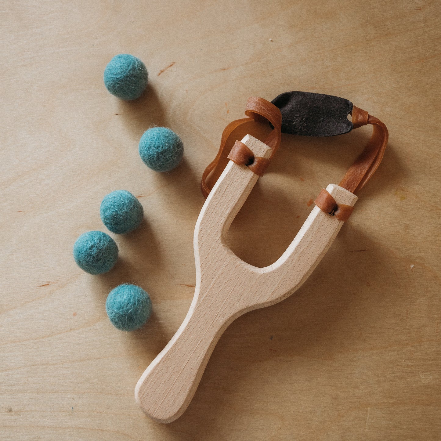 Slingshot + Felt Pellets